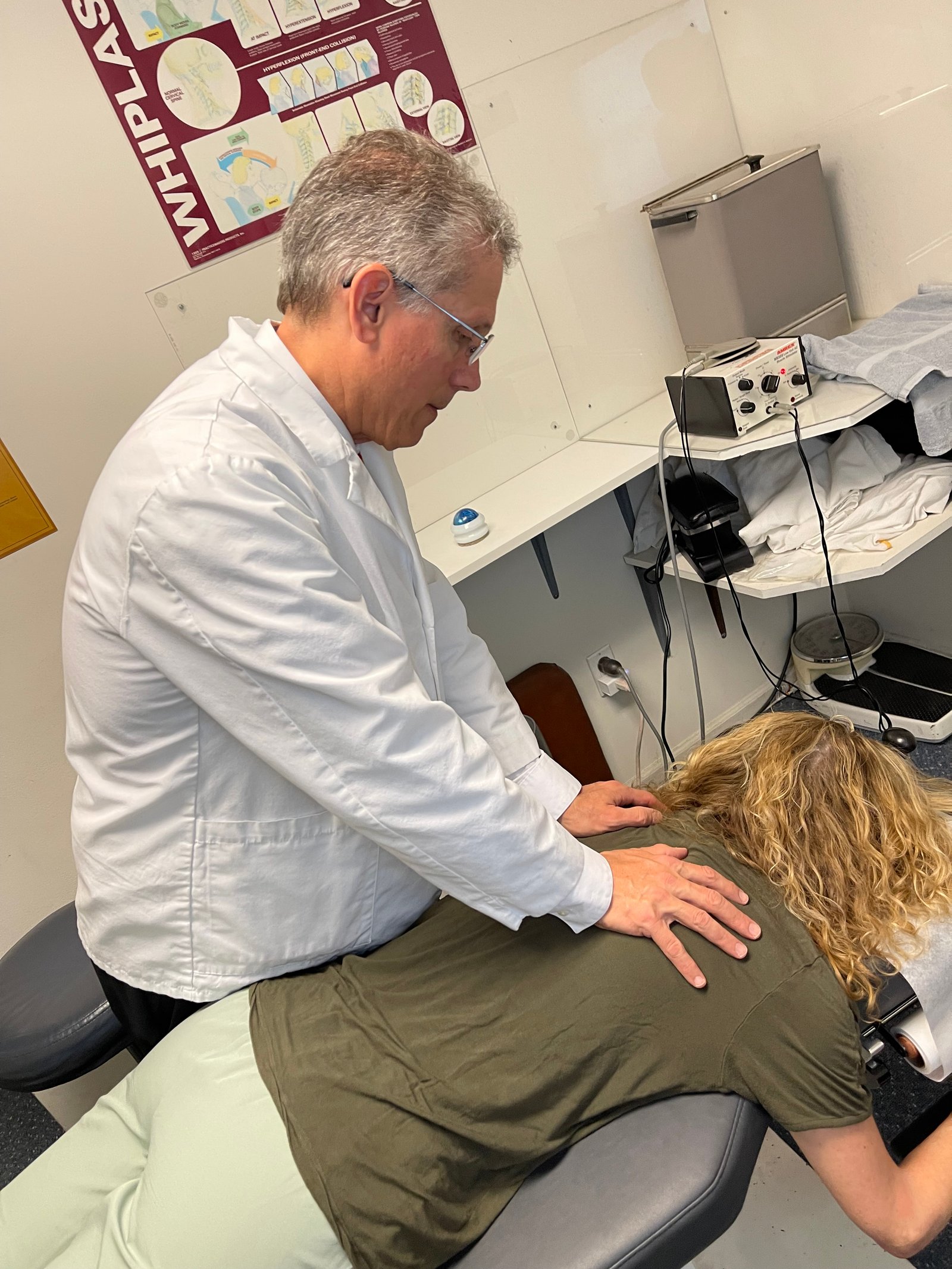 Dr. Brostowin providing hands-on chiropractic care